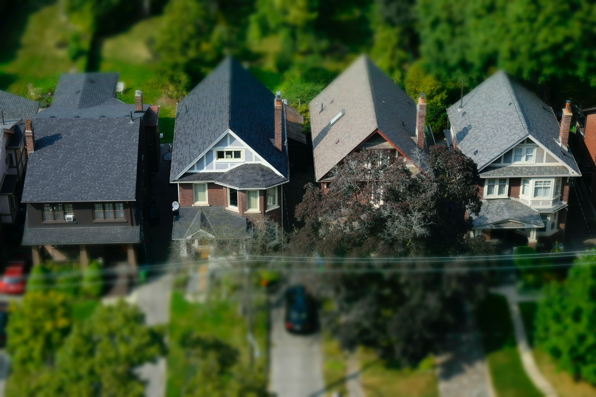 A home exterior framed by trees